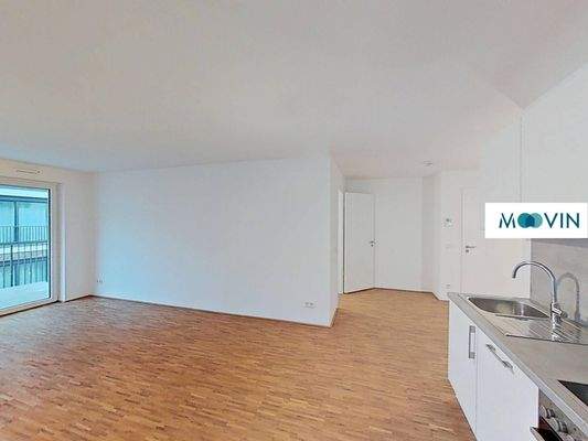 Ansicht IV: Wohn- und Esszimmer mit offenem Küchenbereich