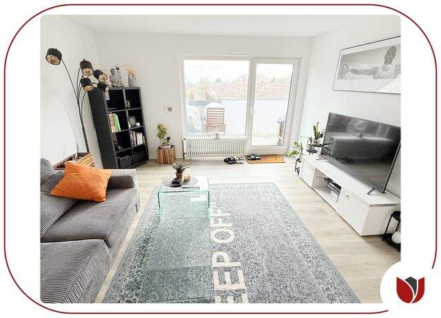 Stilvoll sanierte DG-Wohnung: Dachbalkon, Einbauküche, PKW-Stellplatz - Foto 2