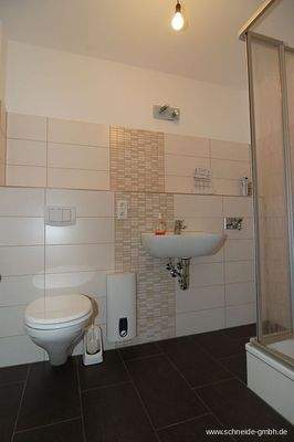 z.B. Duschbad modernisiert