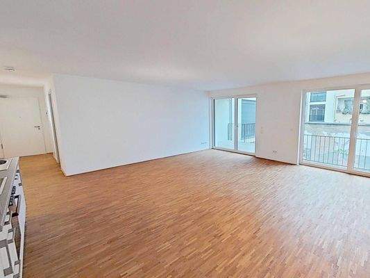 Ansicht V: Wohn- und Esszimmer mit offenem Küchenbereich