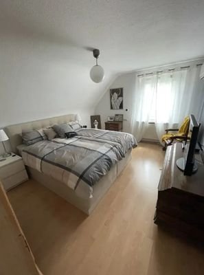 OG: eins der Schlafzimmer