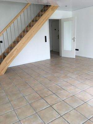 Wohnzimmer mit Zugang zum OG