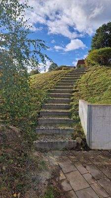 Treppe vom Untergeschoss zum oberen Teil - Erdgeschoss