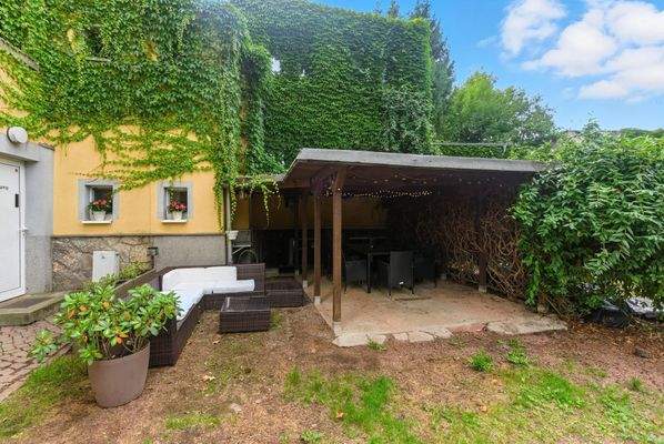 Carport als überdachter Außensitzbereich