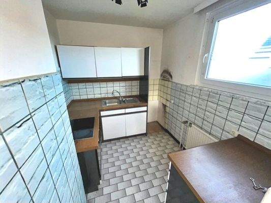 Außergewöhnliche Fliesengestaltung in der Küche (OG)