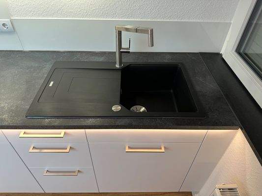Küchenspüle mit Restebecken