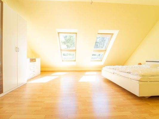 Schlafzimmer unter dem Dach