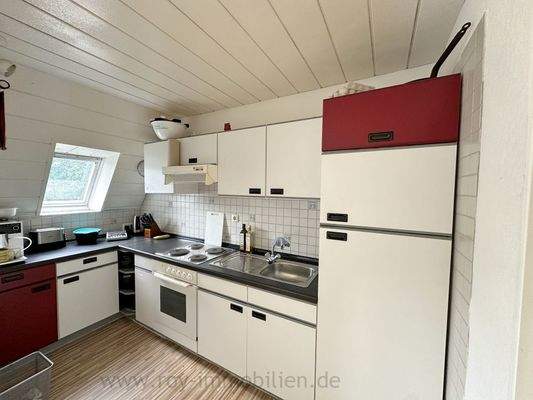 ...mit Einbauküche...