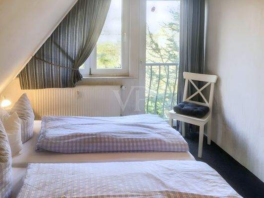 Wohnung 1 - Schlafzimmer