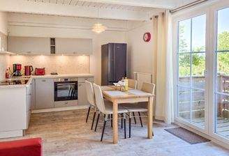 Wohn/Essbereich mit Balkon nach Westen.jpg