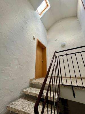 Treppenhaus mit Dachfenster