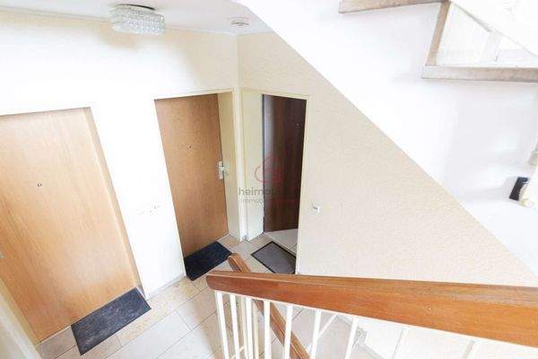 Treppenhaus mit Wohnungseingang