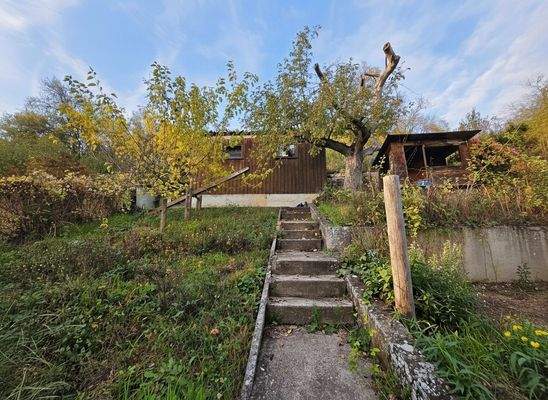 Ansicht Gartenbereich mit Geräteschuppen und Kinderspielhaus_#173313