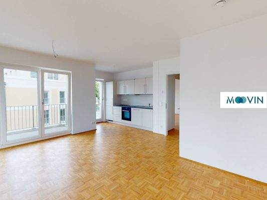 Ansicht II: Wohn- und Esszimmer mit offenem Küchenbereich