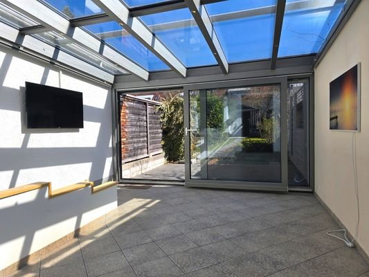 Wintergarten mit Schiebetür
