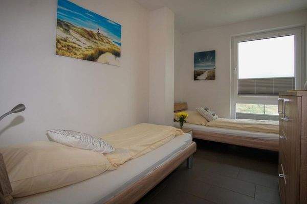 Schlafzimmer mit Einzelbetten