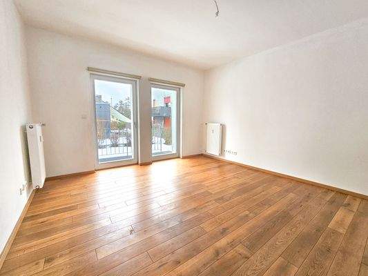 Wohnzimmer EG mit Zugang zu Terrasse