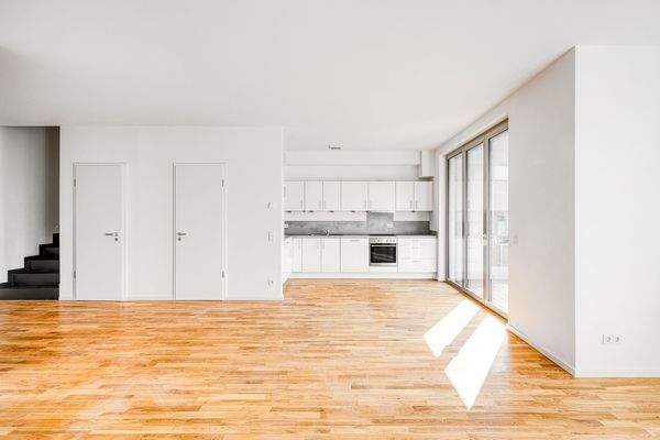 Wohn- und Esszimmer mit offener Küche