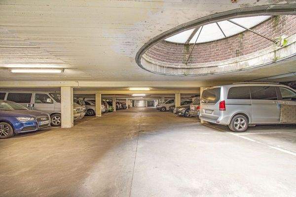 Zur Wohnung zugehörige Tiefgaragenplatz