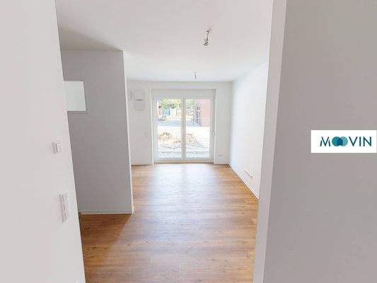 Ansicht V: Wohn- und Schlafzimmer mit offenem Küchenbereich