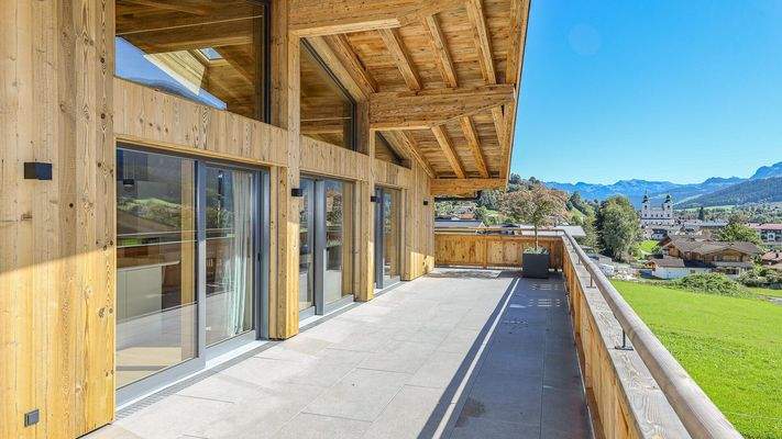 KITZIMMO-Luxuspenthouse sonniger Toplage mit Panorama-Ausblick - Immobilien Brixen.