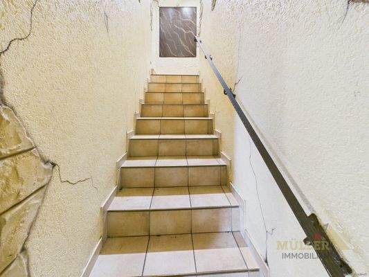 Treppenaufgang zum 1. Obergeschoß