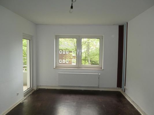 Wohnzimmer mit Balkon