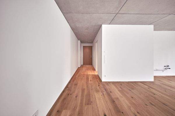 Wohnküche mit Blick zum Eingangsbereich - HERDERGÄRTEN 3.0.3