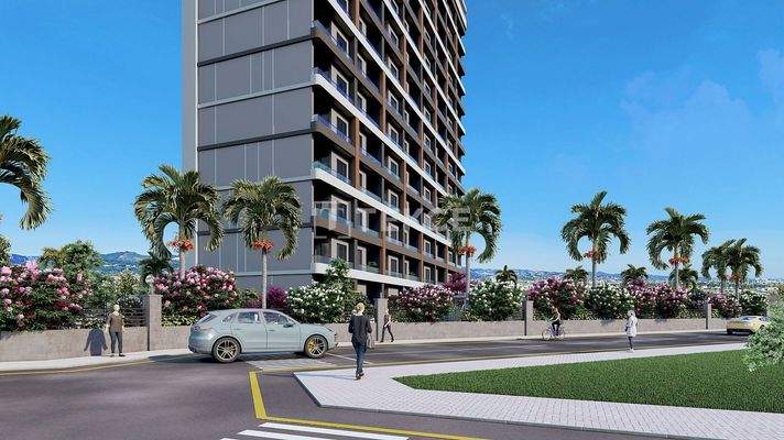 New Apartments in Mersin with a Pool and Modern Landscaping