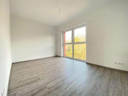 Schlafzimmer mit Blick ins Grün