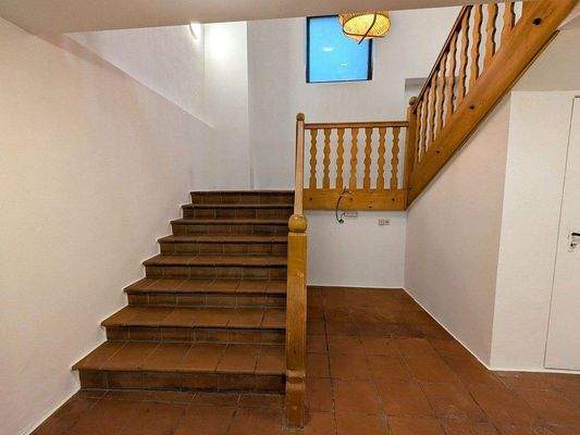 Treppe ins Obergeschoss