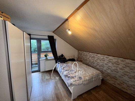 Wohnung 2 - Schlafzimmer