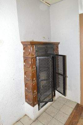 Warmluftofen in der Diele im Erdgeschoss