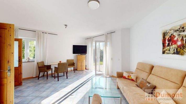 Wohnzimmer der 55 qm Einheit