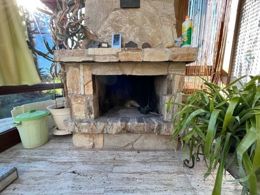 Kamin im Wintergarten.jpg