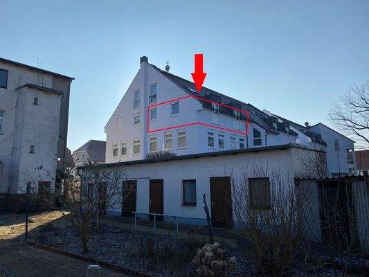 Rückseitige Ansicht mit Wohnungsmarkierung