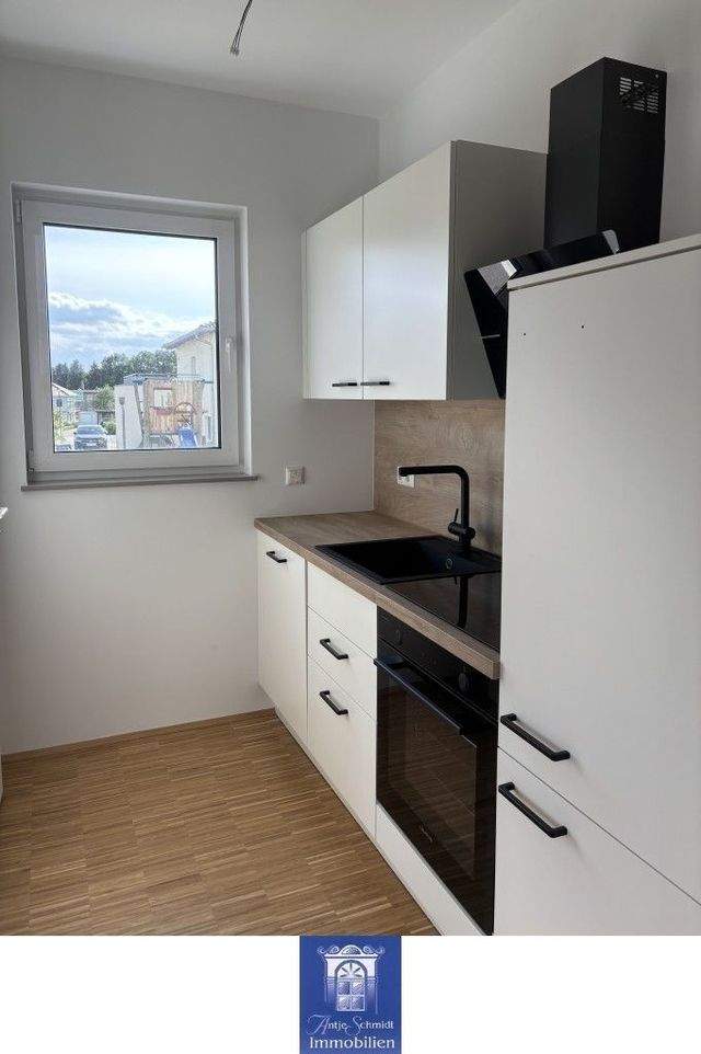 Lieblingsplatz mit attraktiver Ausstattung, moderner EBK und Terrasse im Erstbezug! - Foto 2
