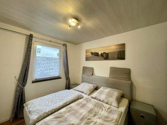 Schlafzimmer Apartment Hinterhofgebäude