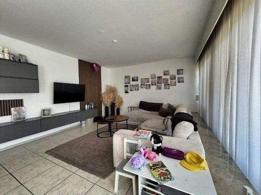 Wohnzimmer der Erdgeschosswohnung 2025