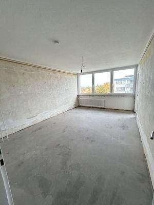 Wohnzimmer mit Balkon