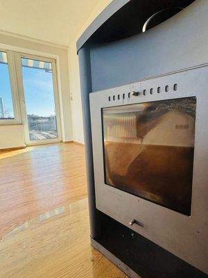 Maisonette: Wohnbereich mit Kaminofen