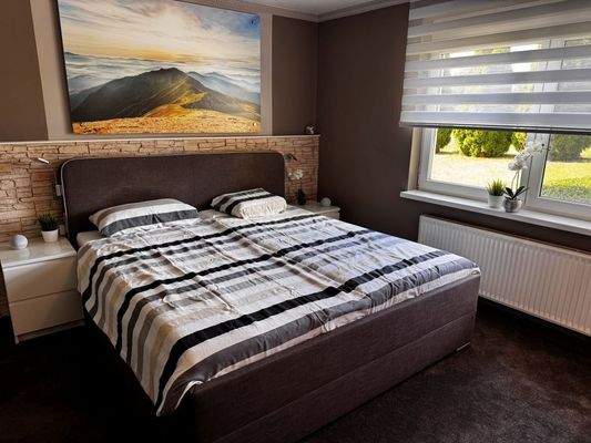 ein Schlafzimmer im EG