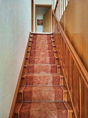 Treppenaufgang zur Einliegerwohnung