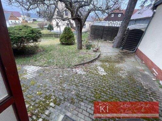 Hinterausgang zur Sitzecke und Garten