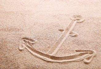 Anker im Nordsee-Sand