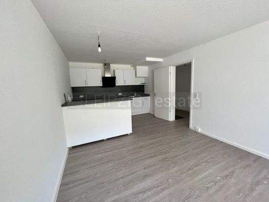 Wohnzimmer zur offenen Küche