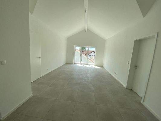 Wohnzimmer mit großer Gaube.jpg