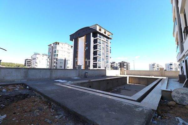 Apartments in a Complex with a Pool and Prime Location in Antalya