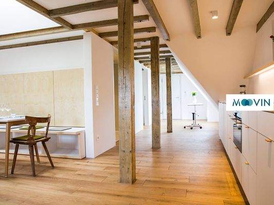 Ansicht III: Wohn- und Esszimmer mit offenem Küchenbereich