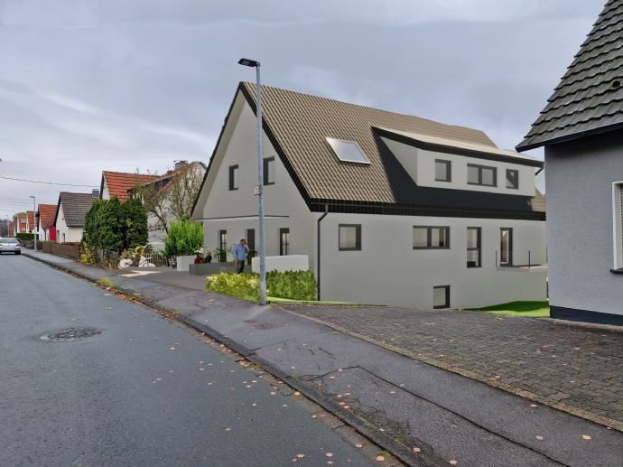 Bildschöne Erdgeschosswohnung mit Terrasse und PKW- Einstellplatz, Fußbodenheizung, und elektrischen  Rollläden im  KFW 40 Haus.